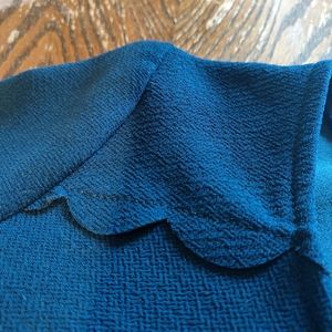 Boutique teal dress with scalloped detail